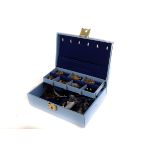 A jewellery box and contents, including two dress rings, a gold plated necklace, earrings, a rosary,