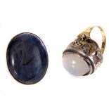 Two large hardstone dress rings, one marked 9ct gold with moonstone style stone, the other marked