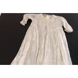 A vintage lace Christening gown, together with a selection of fabric, including hessian (parcel)