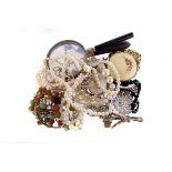 A selection of costume jewellery, to include a yellow metal locket, simulated pearls, paste set