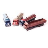 A Dinky Supertoys 504 Foden 14 ton Tanker, two examples, 1st type cabs, one dark blue, one red,