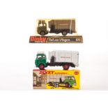 A Dinky Supertoys 978 Refuse Wagon, two examples, one dark metallic green, one lime green, in