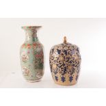 A large Chinese ceramic vase, having famille vert decoration, together with another vase with cover,