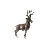 A white metal figure of a stag, unsigned