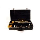 A long model brass cornet by Bach, the series 1001 having serial numer 367954, missing mouth