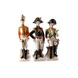 A set of seven Sitzendorf porcelain soldiers, including Grenadier de la Garde, Officer des Hussards,