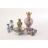 A selection of cloisonne items, to include a large vase, with smaller examples, a set of four napkin