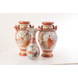 A pair of large Chinese Kutani vases, both having applied mythical creature handles, together with