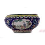 A Chinese enamelled bowl, possibly early 20th century, having well painted vignettes of figures in