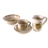 A Denby stoneware service, the neutral ground having green floral decoration, comprising bowls, cups