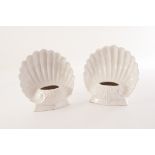 A pair of Italian shell vases, the white glazed vases with shell back and swag design to lower,