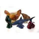 A selection of animal figures, including a Royal Doulton Flambe duck, a Wade Lady and the Tramp,