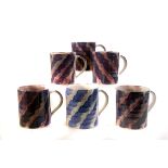 A selection of ten Aldermastion pottery mugs, all having a very similar design, all marked to