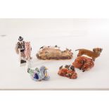 A small assortment of porcelain animal figures, including a Rosenthal Daschund, a Royal Doulton