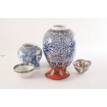 A selection of oriental and other blue and white ceramics, including a teapot, ginger jar, dishes