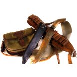A green canvas shooting bag, together with a leather cartridge belt, a small machete and another