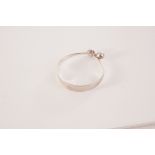 A Danish silver bangle, the crossover bangle having a silver ball to each terminal, marked 925 and