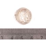 A Hadrian period silver Denarius coin, believed to be 117 to 138 AD, with laurette head, the reverse