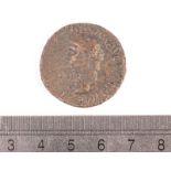 A Roman copper coin, from the reign of Claudius 41 to 54 AD, with bare head of Claudius, reverse