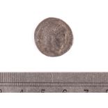 A Constantine the Great copper coin, believed to be 307 to 337 AD, with head facing right, the