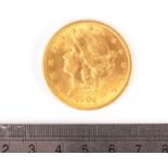 A US Twenty Dollar gold coin, dated 1904, VF, approx 33.4g