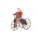 A rare Stevens & Brown clockwork Velocipede, 1870s, the rider with painted stiffened oil-cloth head,