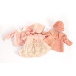 1930s Doll’s clothes: com­prising a pink felt jacket, trimmed bonnet and muslin skirt, probably