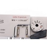 A Leica M4 Rangefinder Body, chrome, serial no. 1179487, body, G-VG, shutter working; engraving to