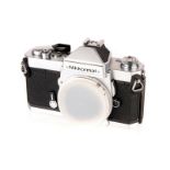 A Nikon Nikkormat FT3 SLR Body, chrome, serial no. 6014352, body, E, shutter working, in maker’s box