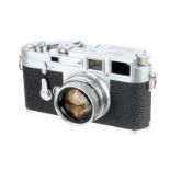 A Leica M3 DS Rangefinder Camera, 1955, type I, chrome, serial no. 730592, with Leitz Summicron f/