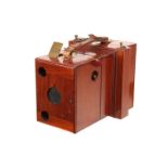 A W. W. Rouch & Co. Eureka Rollerblind Mahogany Detective Camera, 4.5x6.4”, with unmarked rotrary