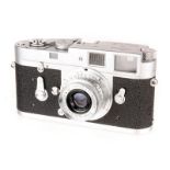 A Leica M3 Rangefinder Camera, 1965, chrome, serial no. 1112206, with Leitz Summaron f/3.5 35mm