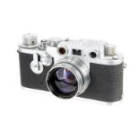 A Leica IIIf Red Dial Delay Rangefinder Camera, 1954, chrome, serial no. 698673, with Leitz Summitar