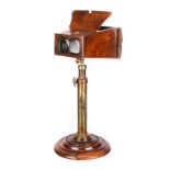 A Brewster-pattern Stereoscopic Viewer, in fine walnut veneer, mounted on a telescopic brass