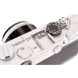 A Canon 7sZ Rangefinder Camera, chrome, serial no. 121508, with Canon f/1.4 50mm lens, chrome,