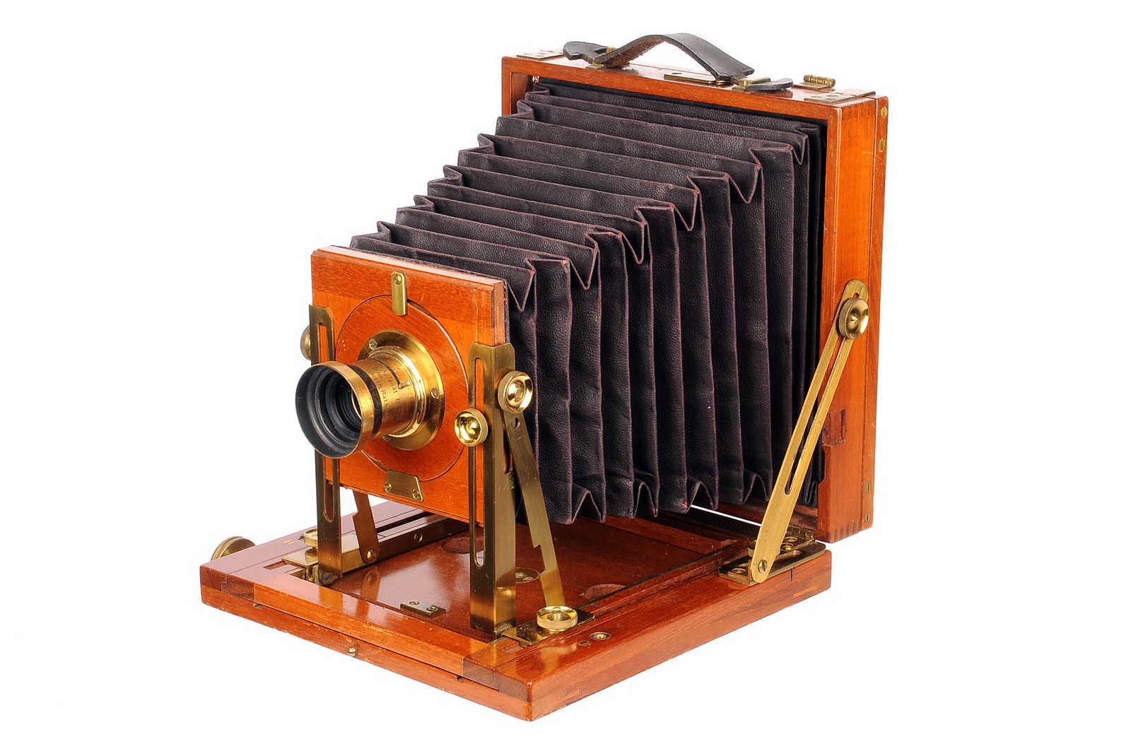 An Unmarked Mahogany Field Camera, with rear swing movements, 4½x6¼, with Busch’s Rapid Aplanat No.2