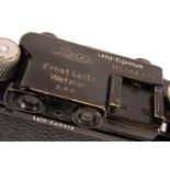 A Leica III Rangefinder Camera, black, serial no. 166373, with Leitz Elmar f/3.5 50mm lens,