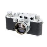 A Leica IIIc Rangefinder Camera, 1940, chrome, red blind, serial no. 363430, with Leitz Summitar f/2