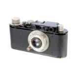 A Leica II Rangefinder Camera, 1932, lavatory seat model, black, serial no. 83750, with Leitz