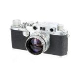 A Leica IIIf Rangefinder Camera, 1951, chrome, serial no. 543412, with Leitz Summitar f/2 50mm lens,