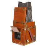 A City Sale & Exchange Salex Tropical Reflex Camera, 3¼x4¼, brass bound corners, with Ross Tessar