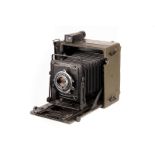 A Graflex Speed Graphic Signal Corps U.S. Army KE-12-1 Camera, green, serial no. 892576, military