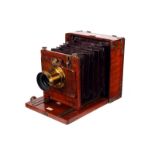 A Perken, Son & Rayment Patent Mahogany Field Camera, 4½x6¼, brass bound, with Perken, Son & Rayment