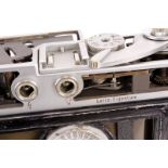 A Leica M1 Rangefinder Cutaway Body, chrome, body, G, shutter working; engraving to rear of