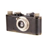 A Leica Ic Camera, 1931, black, serial no. 65663, with Leitz Elmar f/3.5 50mm lens, nickel, body, F,