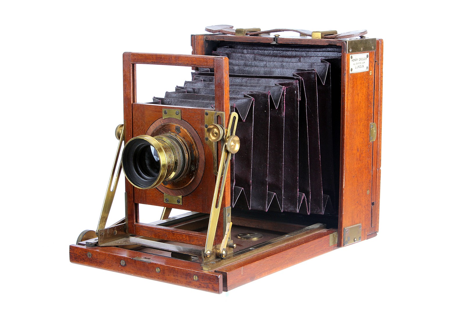 A Henry Crouch Mahogany Field Camera, with rear folding bed, 4½x6¼”, with unmarked f/8 brass lens,