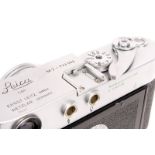 A Leica M3 Rangefinder Camera, chrome, serial no. 733564, with Leitz Summicron f/2 50mm lens,