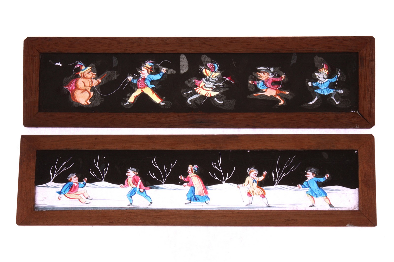 Mahogany-mounted Magic Lantern Slides: comic characters, hand painted, 254 x 65mm, in wooden box,