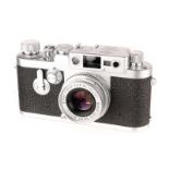 A Leica IIIg Rangefinder Camera, 1960, chrome, serial no. 987847, with Leitz Elmar f/2.8 50mm