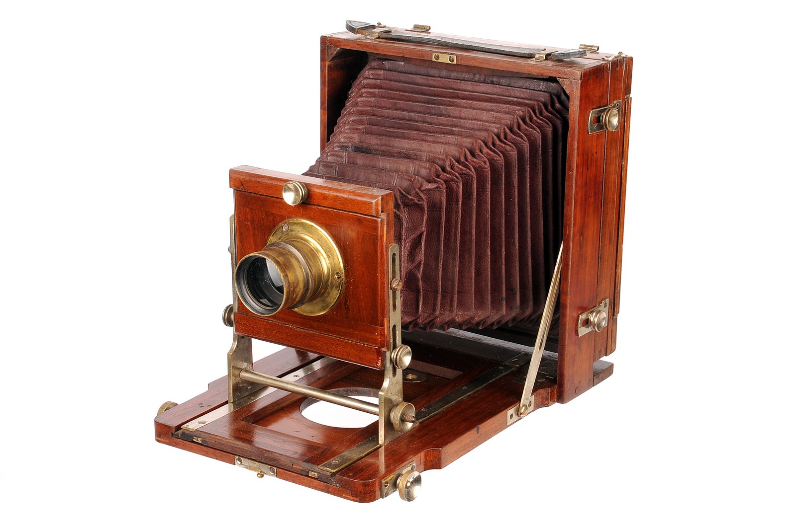 An Unmarked French Mahogany Field Camera, 5x7”, with Rectilineaire Extra Rapid f/8 13x18 brass lens,